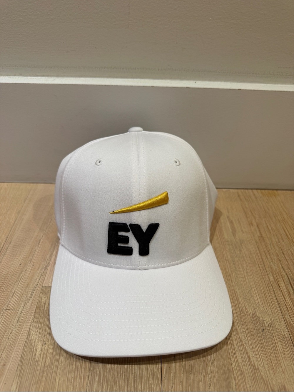 White EY Embroidered Baseball Cap with Yellow Accent